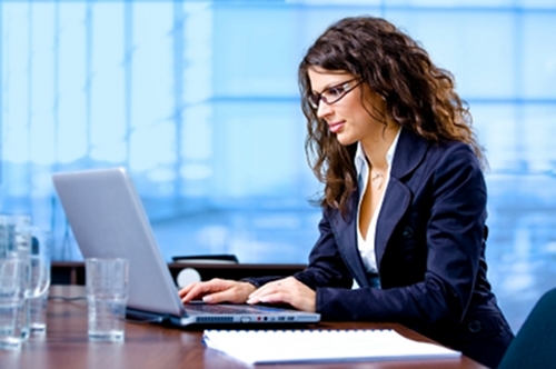 Businesswoman using laptop