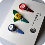 mollette-per-capelli-bottone