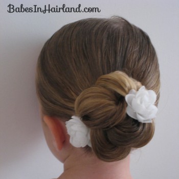 acconciature prima comunione chignon intrecciato