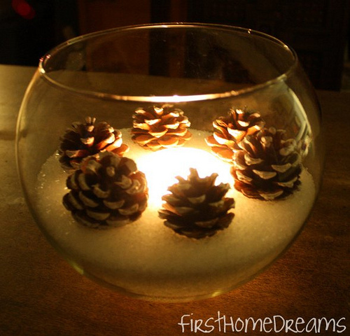 centrotavola con pigne sale e candela 